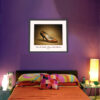 Framed Bally Cinnamon Leather Pumps art print from the famous Imelda Marcos Shoe Collection displayed above a bed in a contemporary bedroom.