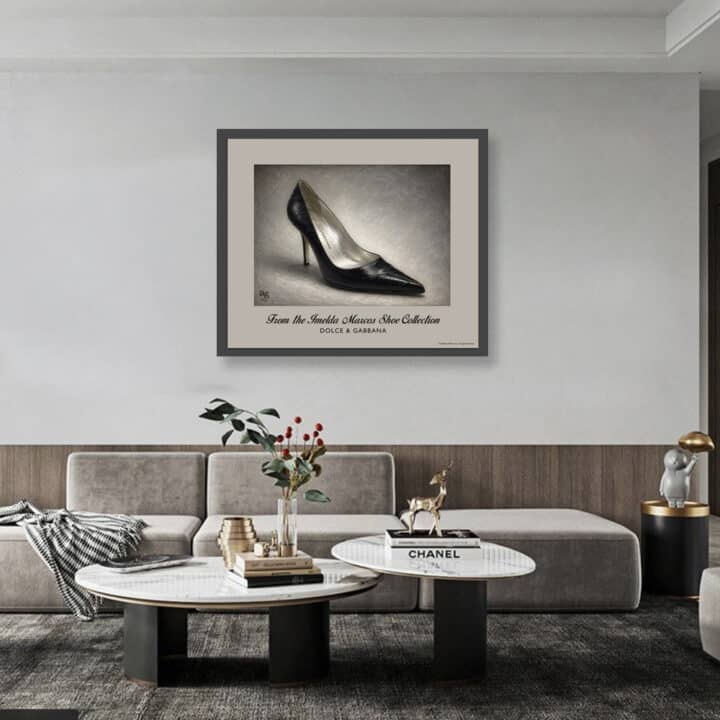 Framed Dolce & Gabbana Eel Skin Pump art print from the Imelda Marcos Shoe Collection displayed in a contemporary living room.