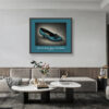 Framed Givenchy Paris Kitten Heel art print in turquoise leather with teal and gold bow, displayed in a contemporary living room.