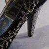 Close-up of René Caovilla Black Velvet Pumps showing crystal embellishments, silver metallic lining and jewelled three-inch heel.
