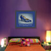 Yves Saint Laurent midnight blue heels art print with sky blue and white trim displayed in a colourful bedroom