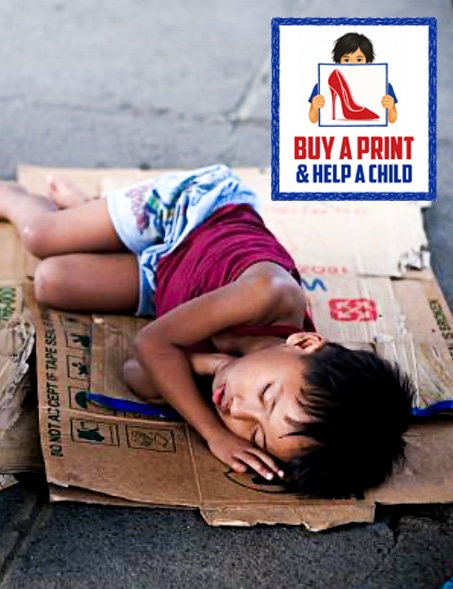 Filipino child sleeping outdoors in Manila, representing the vulnerable children supported by the Sole Support humanitarian project.