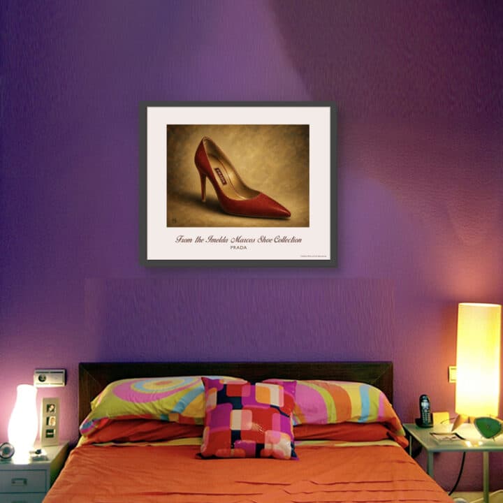 Prada Red Velvet Pumps art print displayed in a bedroom, featuring gold metallic lining and a high stiletto heel