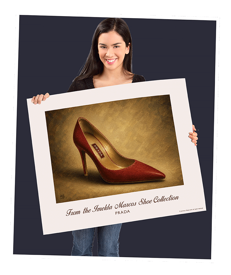 Woman holding a museum-quality Prada shoe art print from the Imelda Marcos Shoe Collection. Every Sole Support print helps vulnerable street children in Manila.