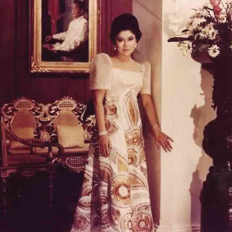 Imelda Marcos wearing an elegant formal gown during her years as First Lady of the Philippines, reflecting her distinctive public image.