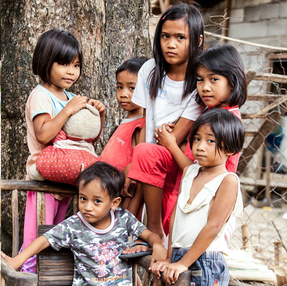 Group of young children from an impoverished community in Manila, Philippines