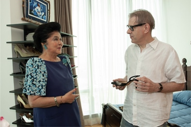 Imelda Marcos and A. J. Green in conversation in Manila